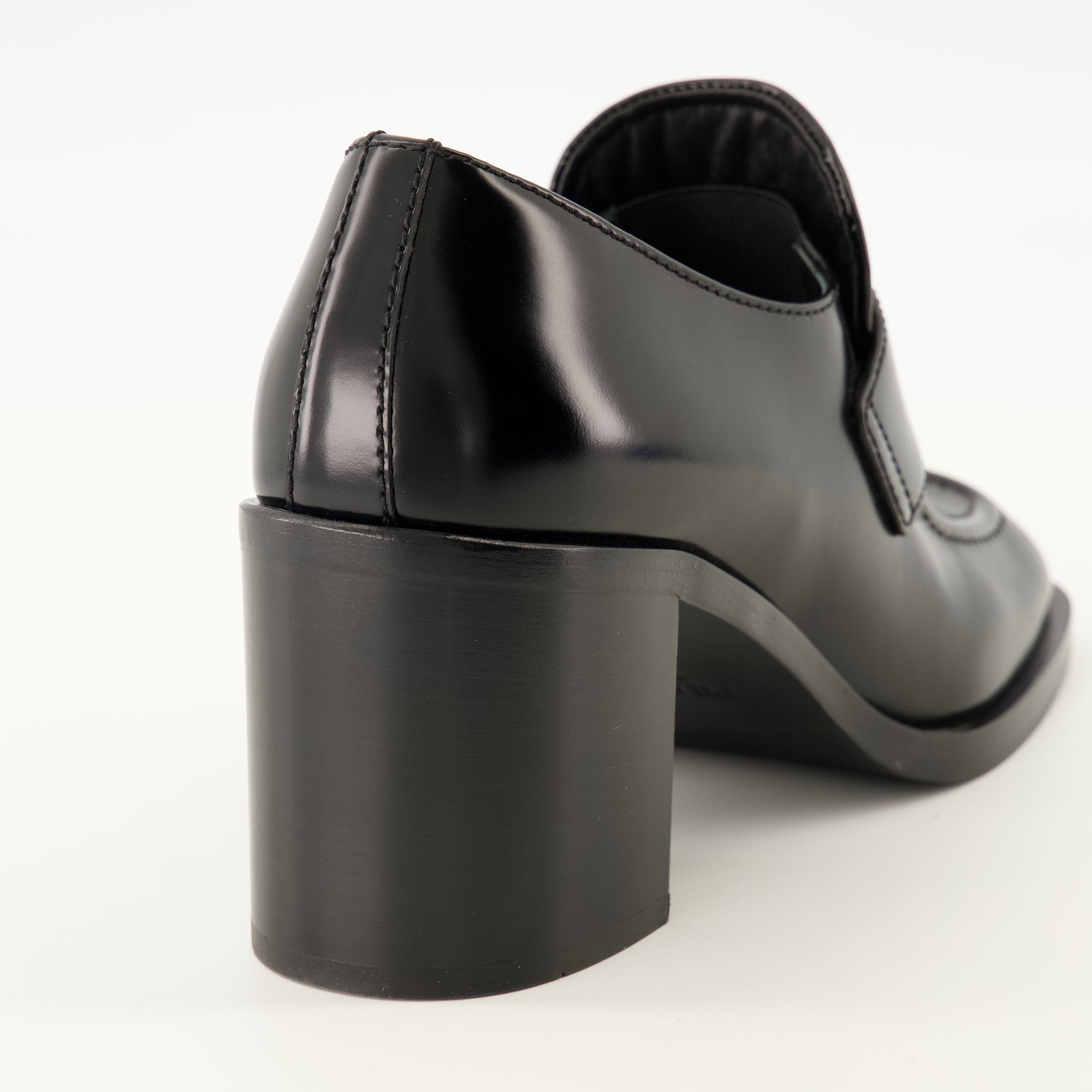 Loafers Heeled moccasins Prada Black Women