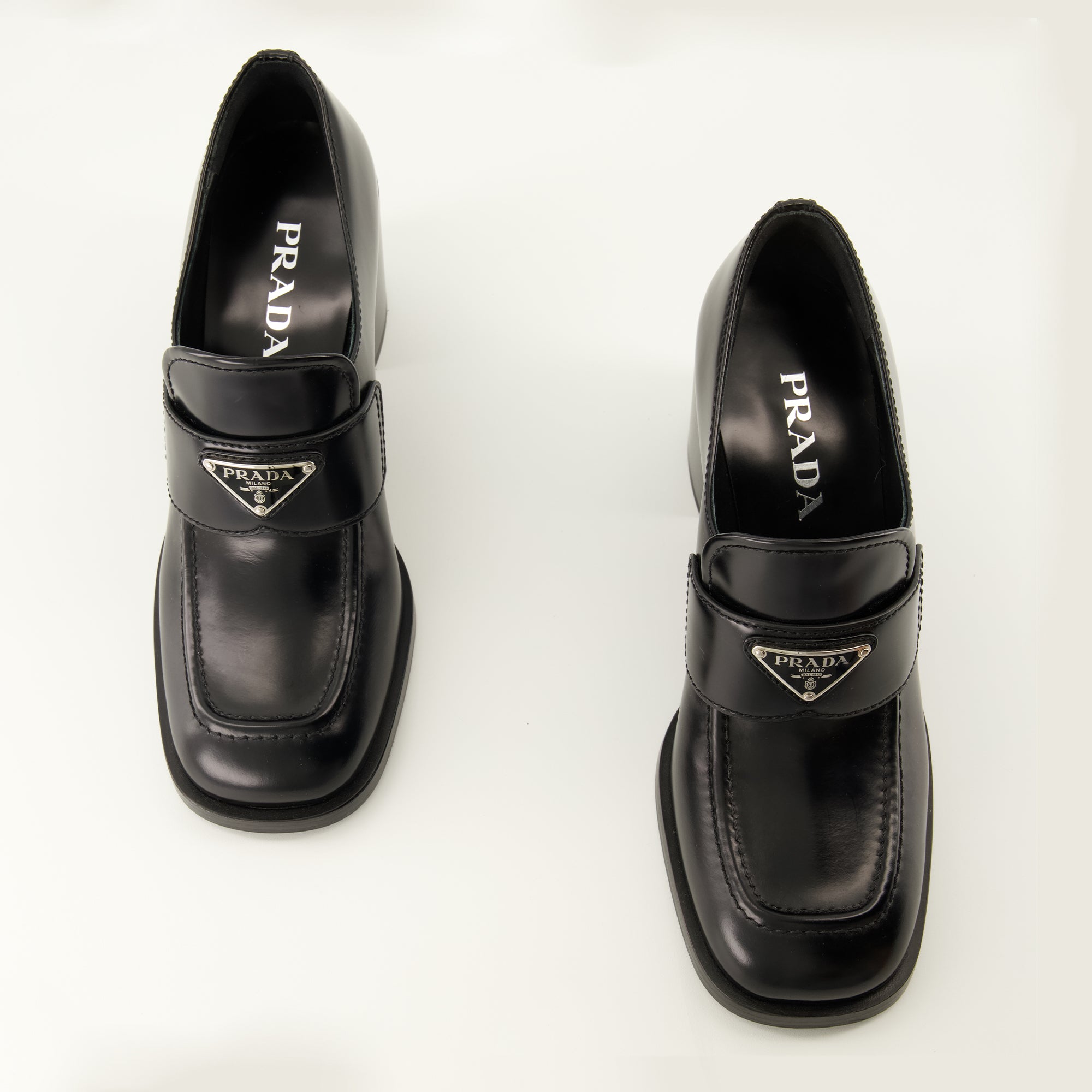 Loafers Heeled moccasins Prada Black Women