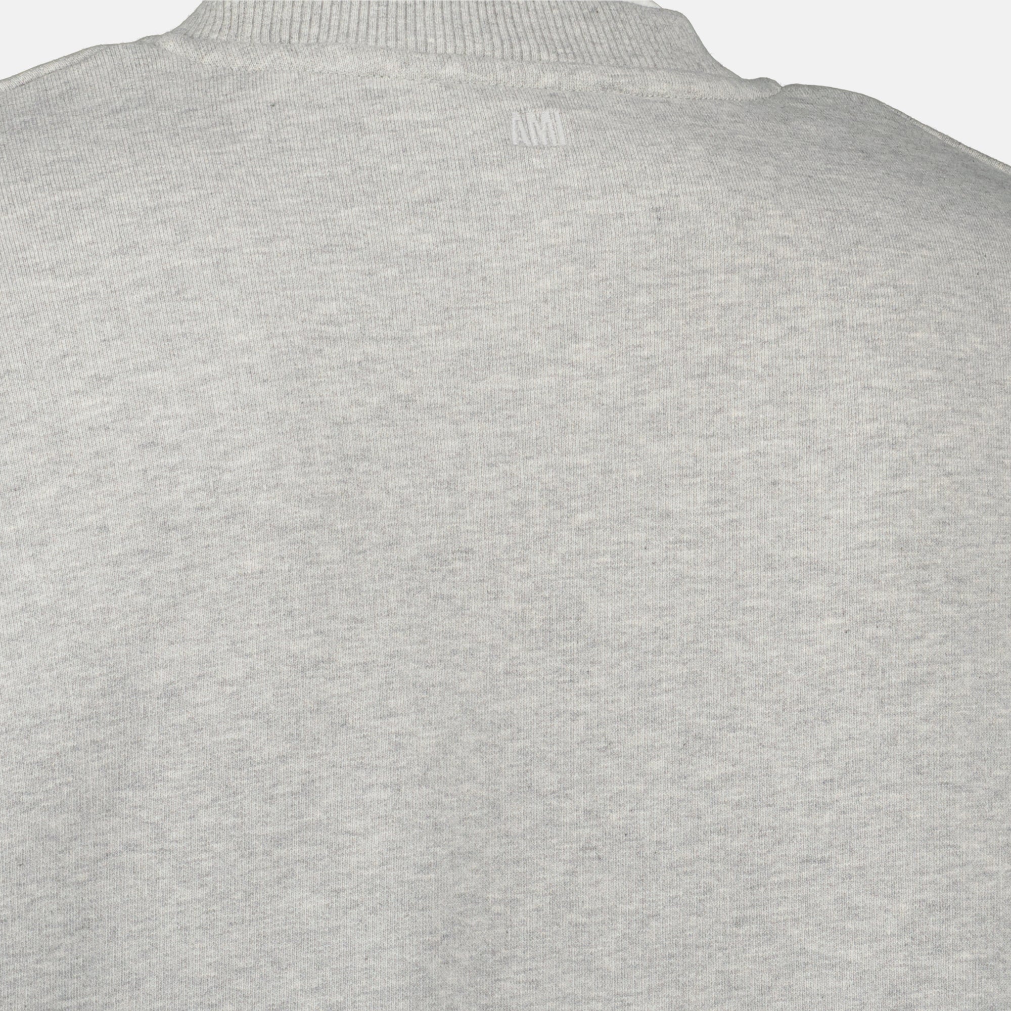Image of the AMI heart sweatshirt from the brand Ami PARIS for Men - Autumn-Winter 2025 - Detailed View 6