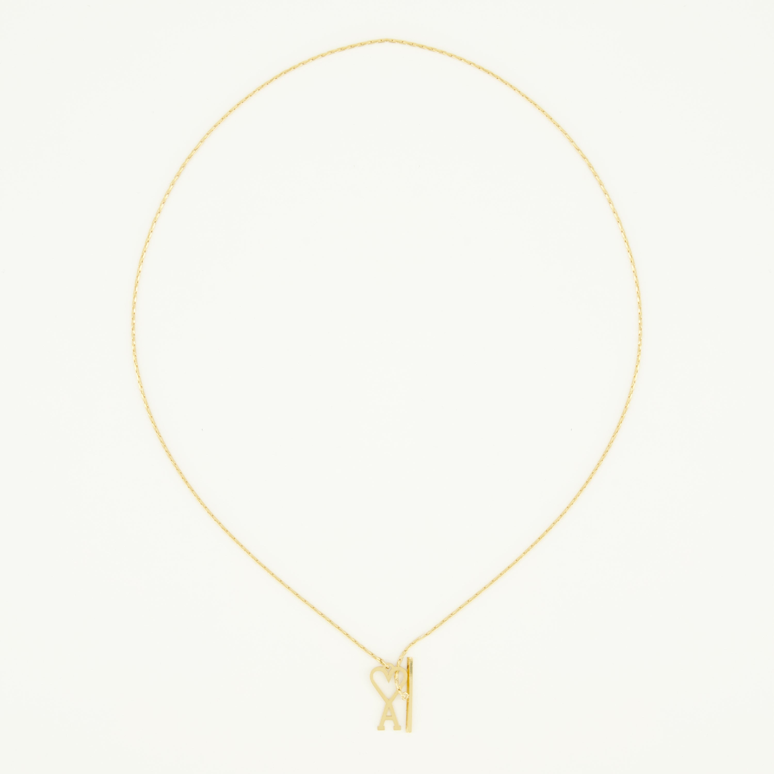 Image of the AMI golden heart necklace from the brand Ami PARIS for Unisex - Spring-Summer 2026 - Front View