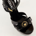 Open shoes Gianni Ribbon Heeled Sandals Versace Black Femme