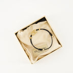 Bild des schwarzen Vlogo-Armbandes der Marke Valentino Garavani für Frauen - Frühjahr-Sommer 2026 - Detailansicht 3