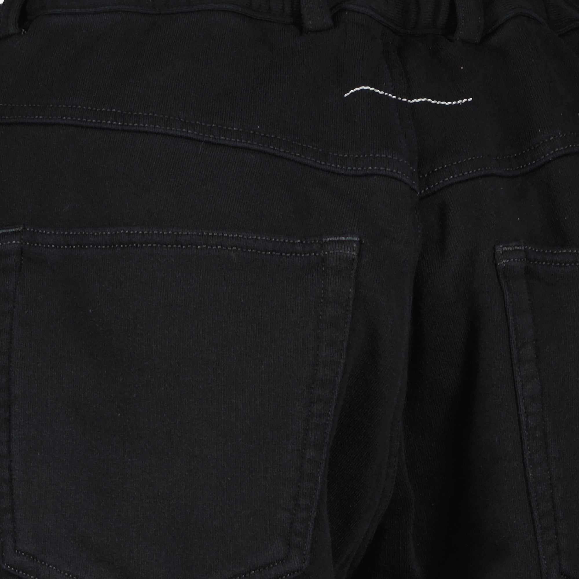 Image of the black wide-leg jeans from Mm6 brand for Women - Spring-Summer 2026 - Detailed View_1