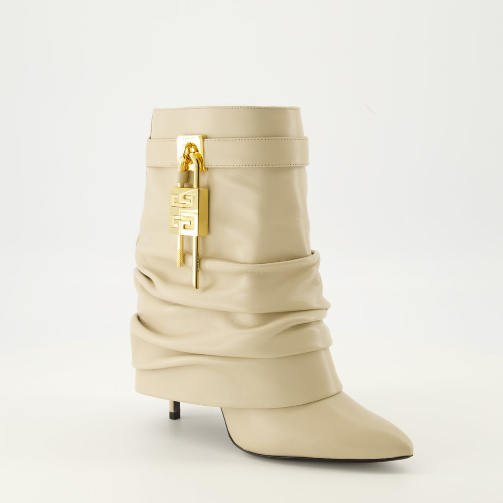 Image of the Givenchy Shark Lock ankle boots for women - Autumn-Winter 2025 season - Right three-quarter front view