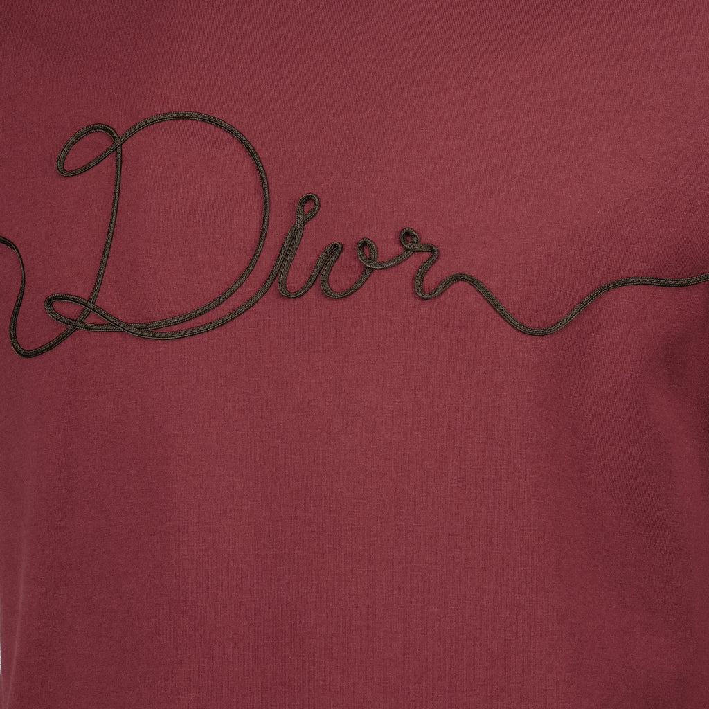 Image of the Dior Ribbon burgundy T-shirt from the Dior brand for Men - Spring-Summer 2026 - Detailed View_2