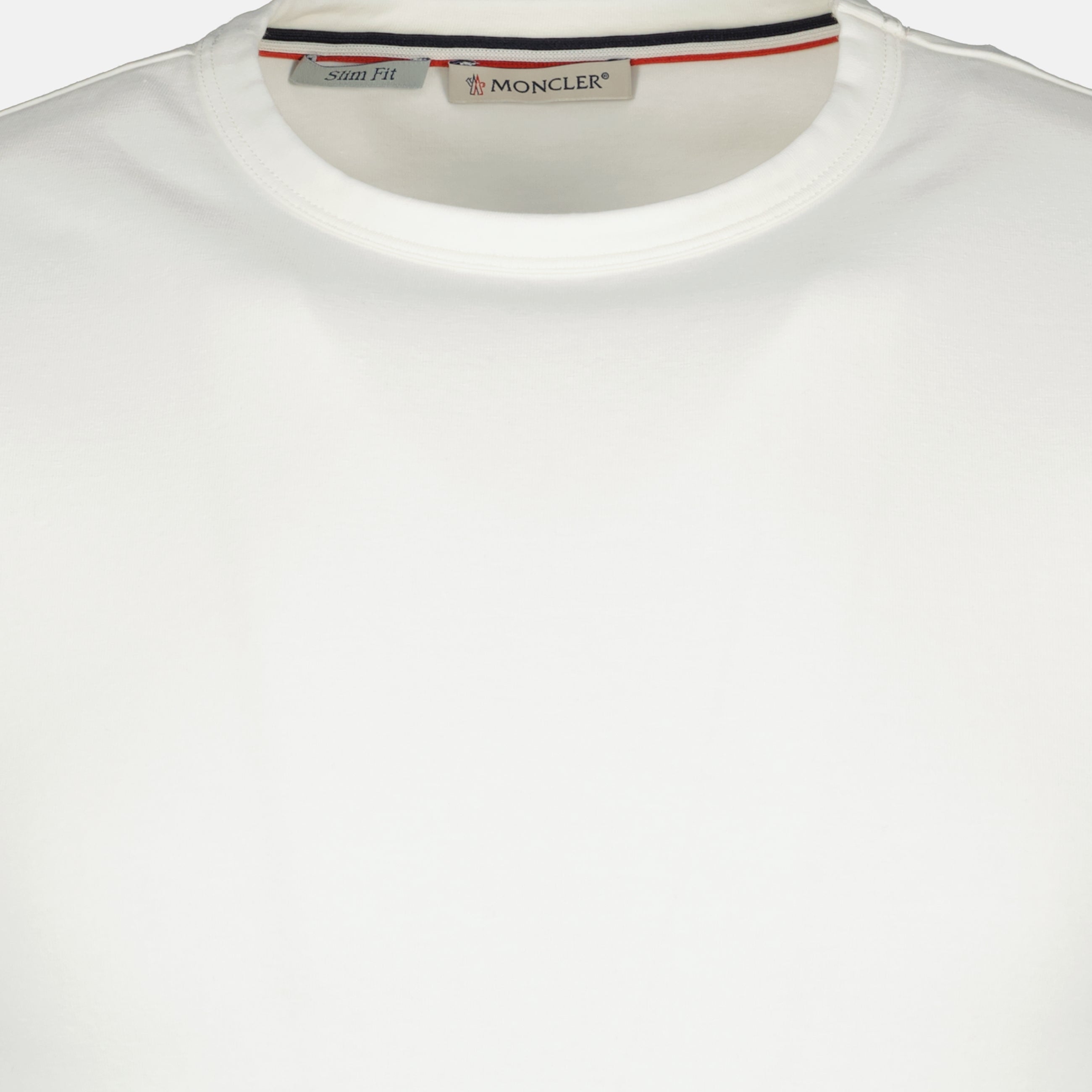 Image of the Moncler brand white-bordered T-shirt for Men - Spring-Summer 2026 - Detailed View 1