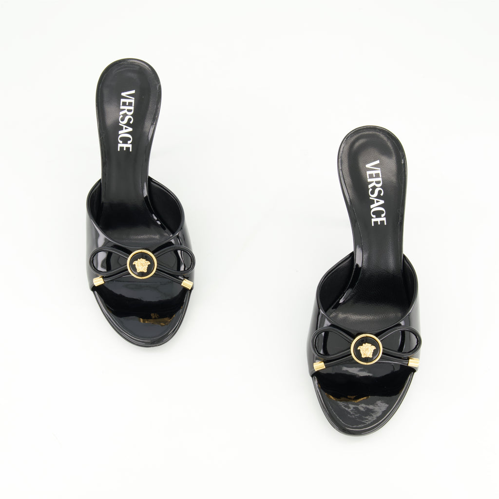 Open shoes Bow Heeled Mules Versace Black Femme