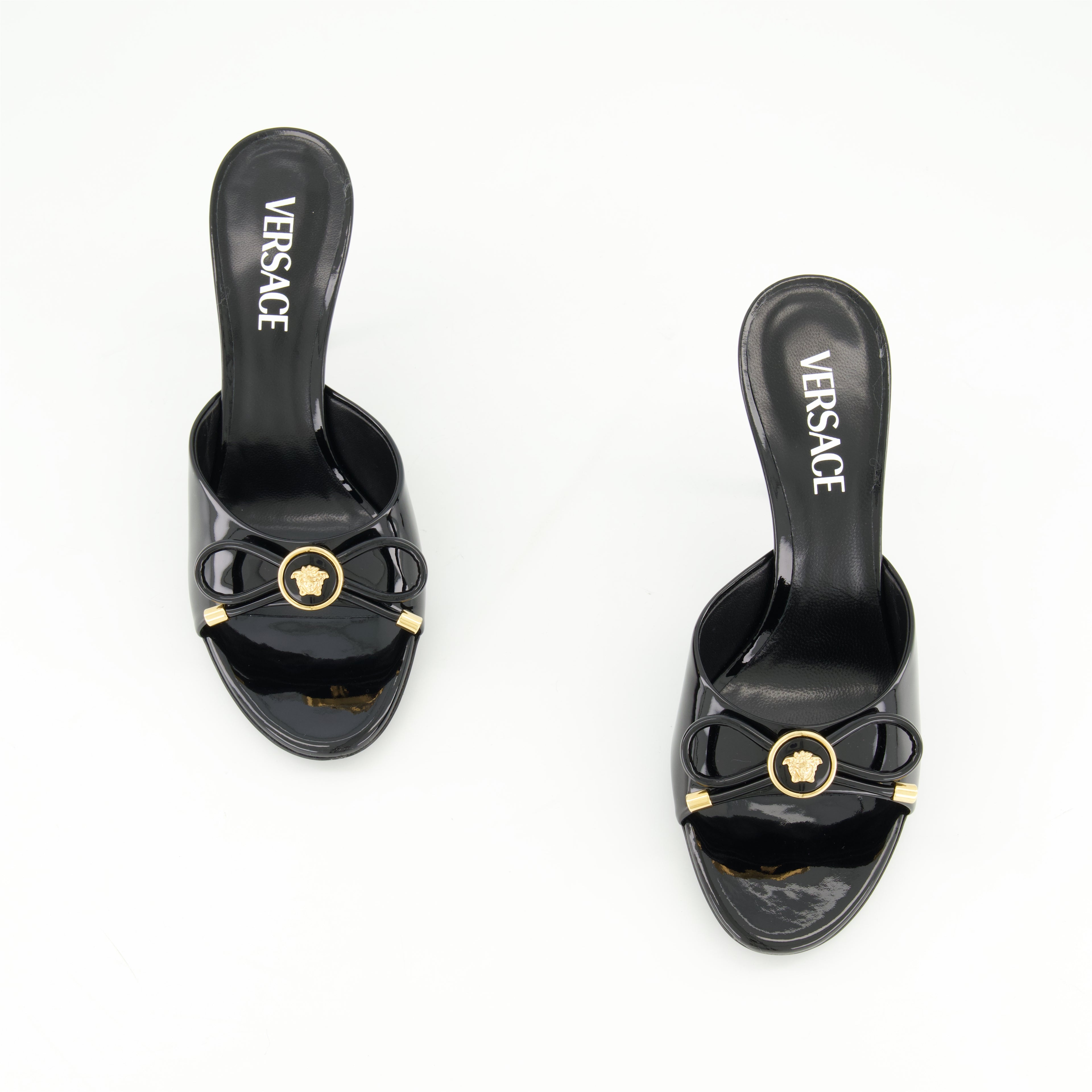 Open shoes Bow Heeled Mules Versace Black Femme