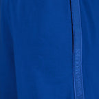 Shorts Short à logo bande Alexander McQueen Bleu Homme