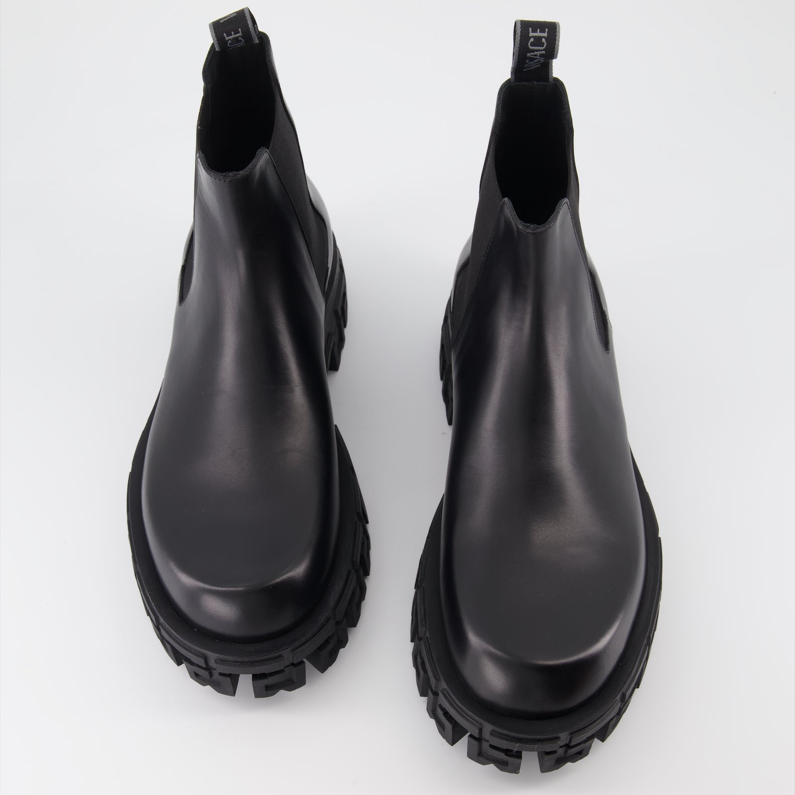 Boots and ankle boots Greca Chelsea Boots Versace Black Man