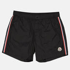 Immagine degli Short da bagno a liserés tricolore del marchio Moncler per Uomo - Stagione Primavera-Estate 2024 - Vista Frontale
