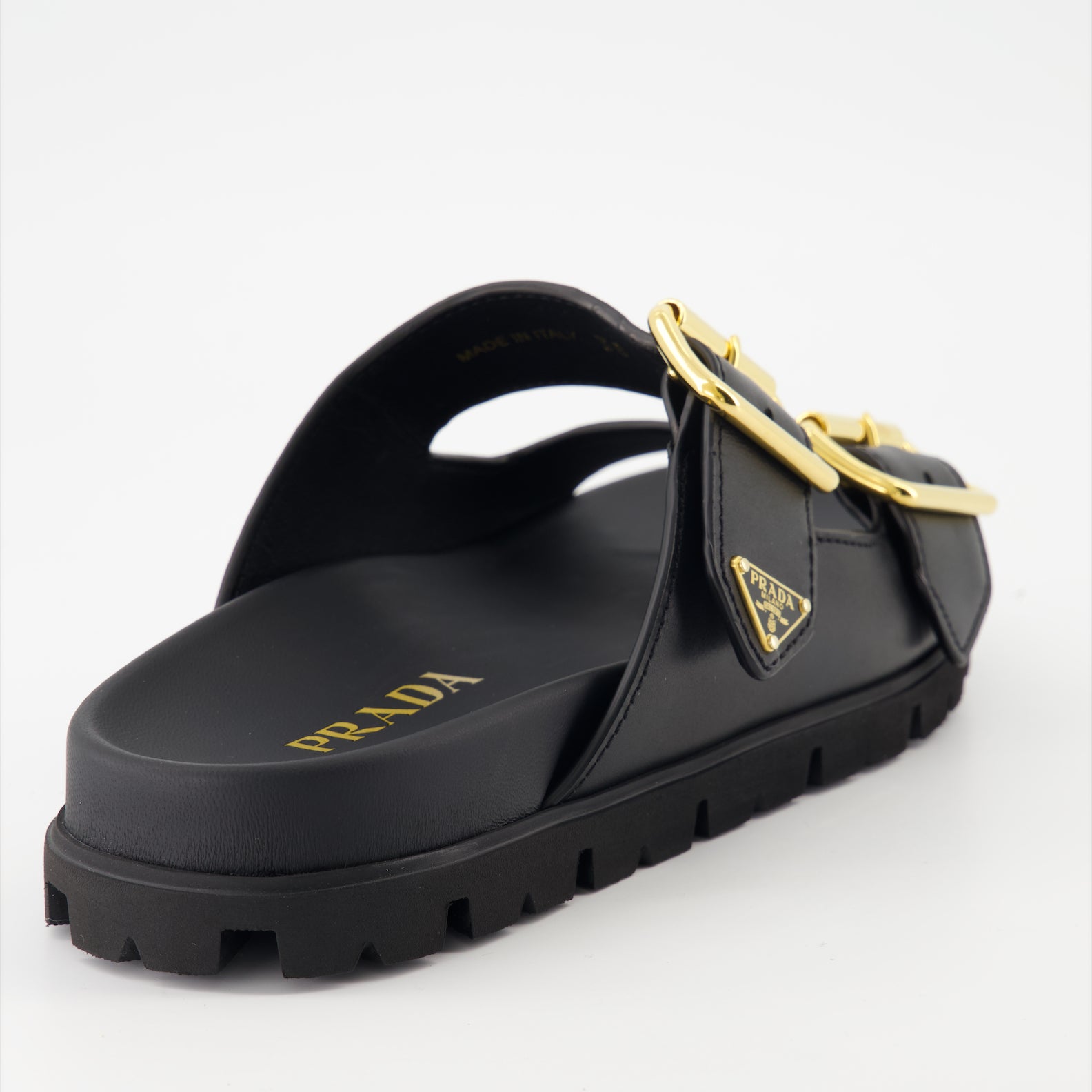 Chaussures ouvertes Claquettes en cuir Prada Noir Femme