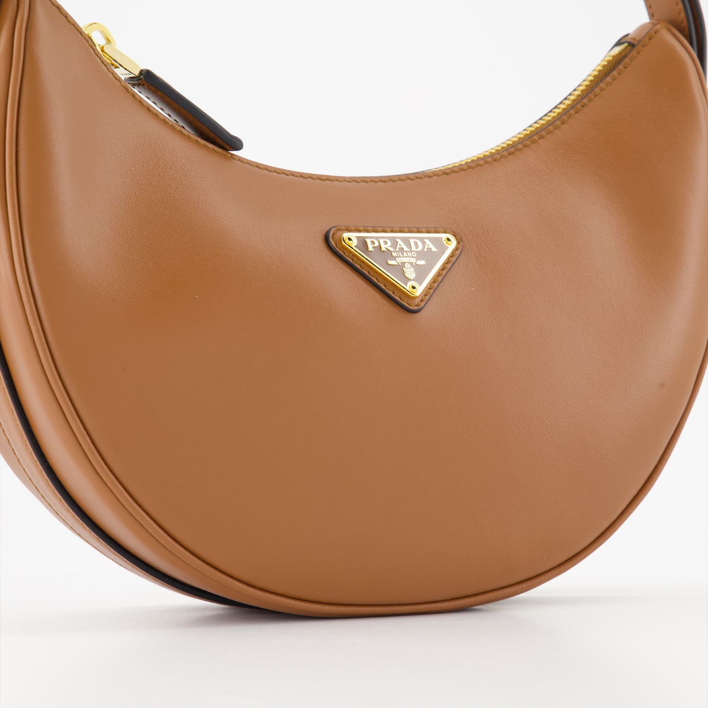 Arched leather bag