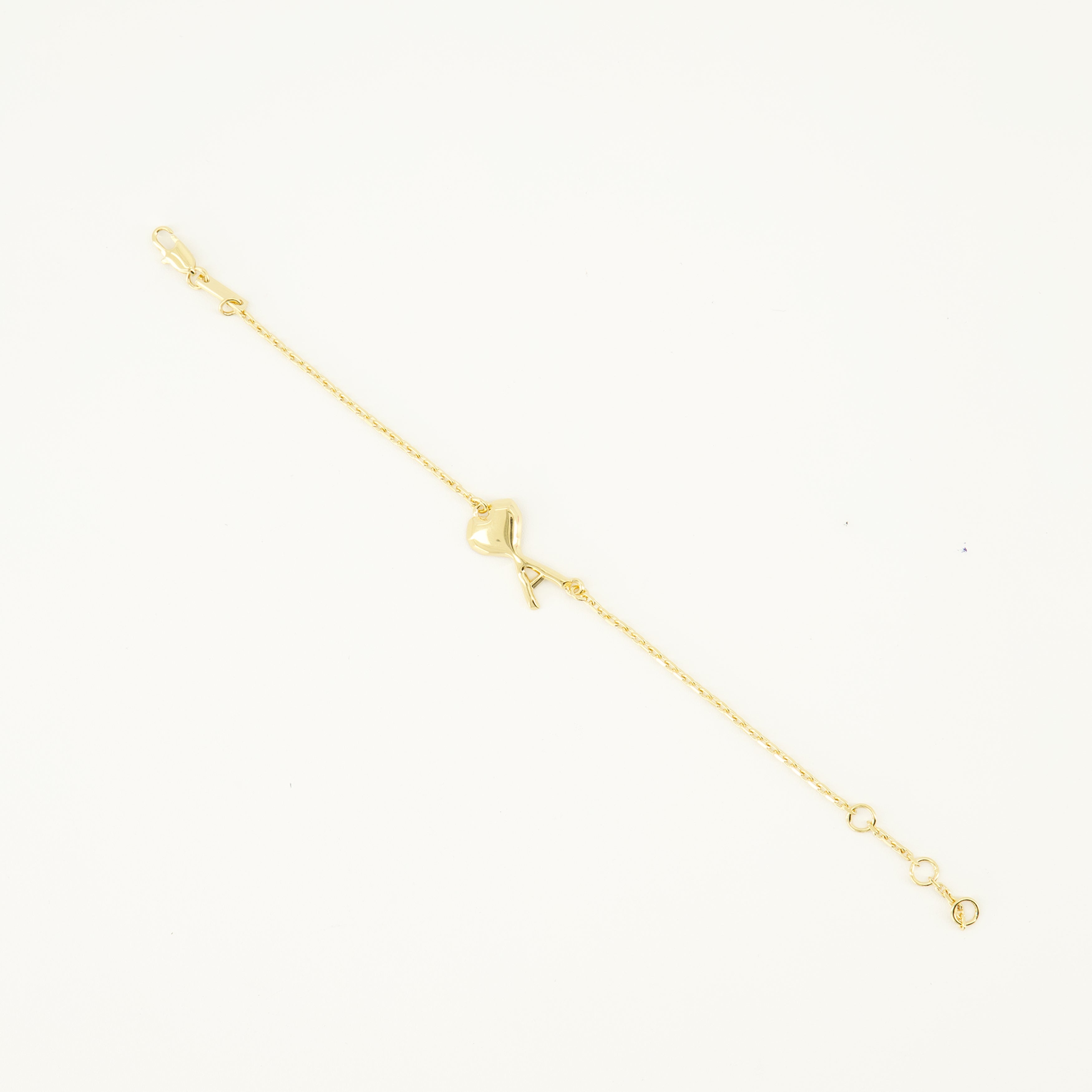 Image of the AMI golden heart bracelet from the brand Ami PARIS for Unisex - Spring-Summer 2026 - Detailed View_2