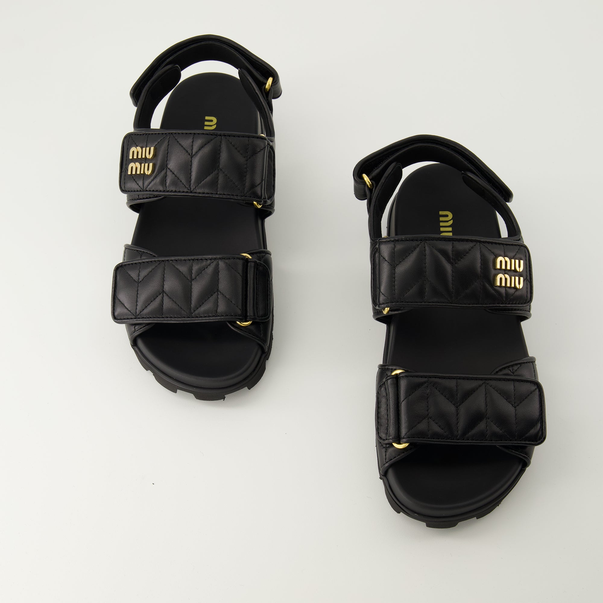 Chaussures ouvertes Sandales en cuir nappa matelassé Miu Miu Noir Femme