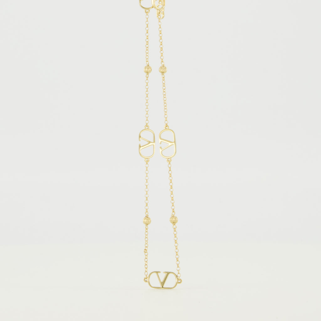 Image of the Vlogo gold necklace from the Valentino Garavani brand for Women - Spring-Summer 2026 - Back View