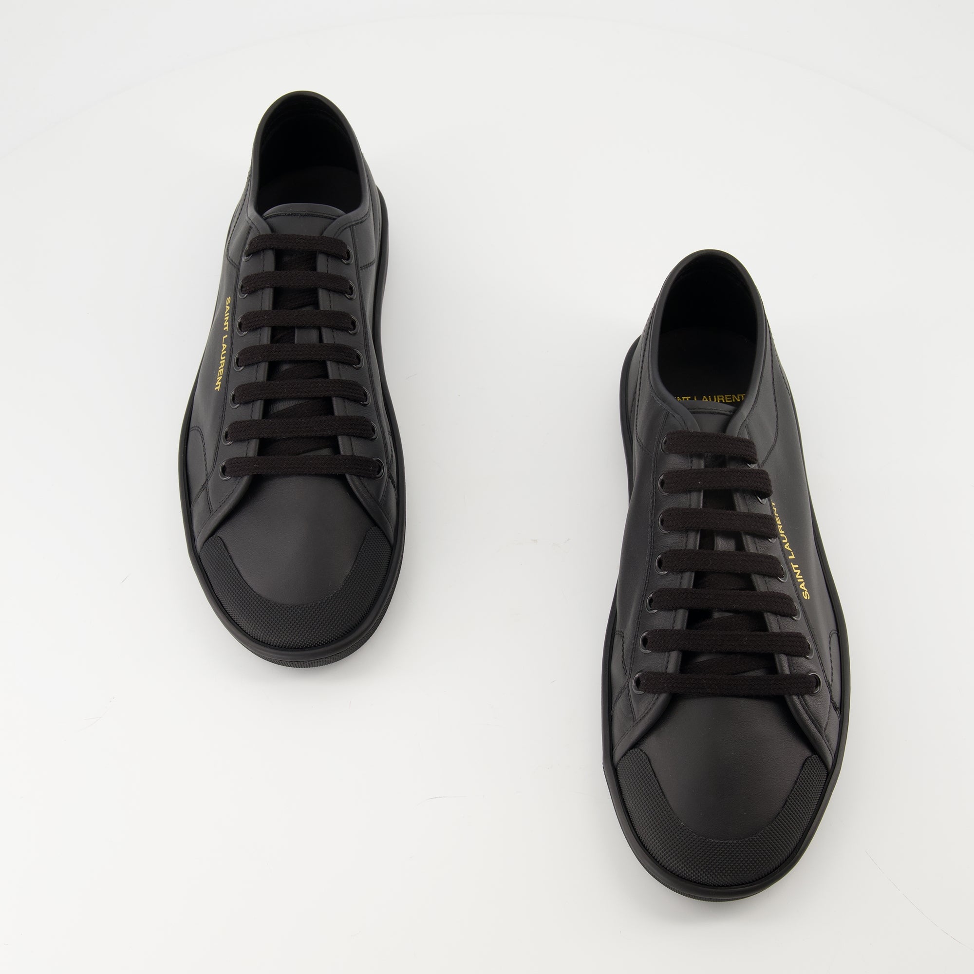 Image of the Saint Laurent Men's Gym Sneakers - Fall/Winter 2025 - Top view of the pair