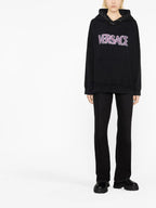 Sweatshirts Sweat à logo usé Versace Noir Femme