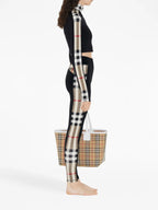 Pantalons Legging à carreaux Burberry Noir Femme