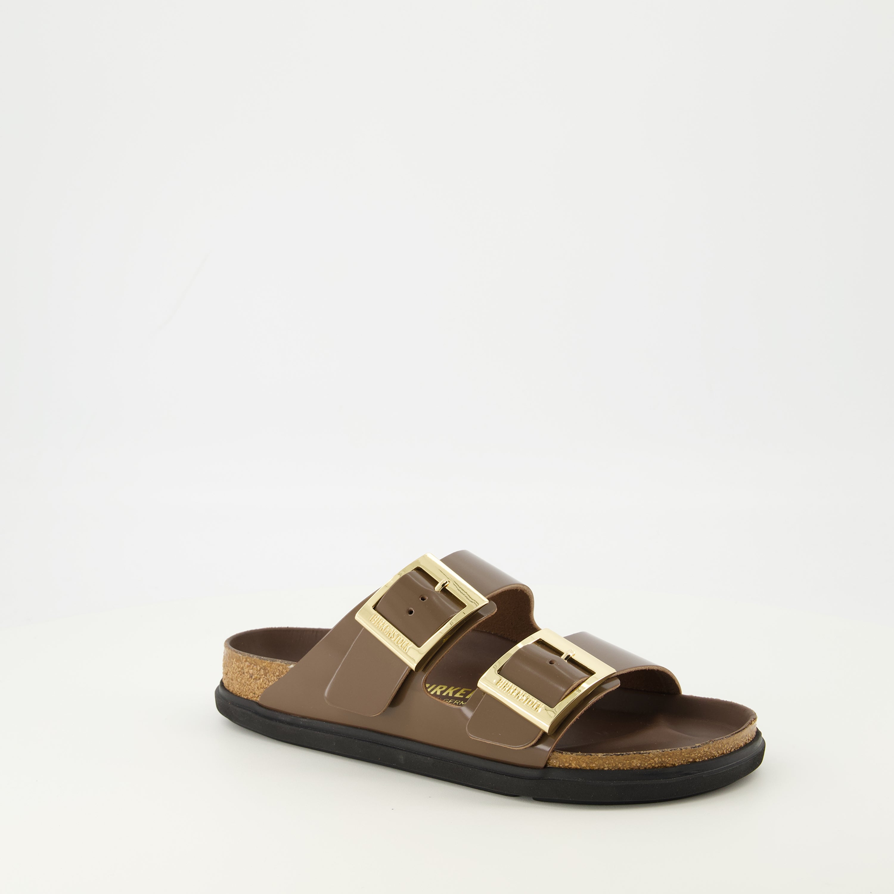 Image of the Arizona Droplet Buckle brown sandals from the brand Birkenstock for Women - Spring-Summer 2026 - Three quarter right front view