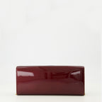 Image of the Saint Laurent Kate Clutch bag in burgundy patent leather for Women - Autumn-Winter 2025 Season - Back View