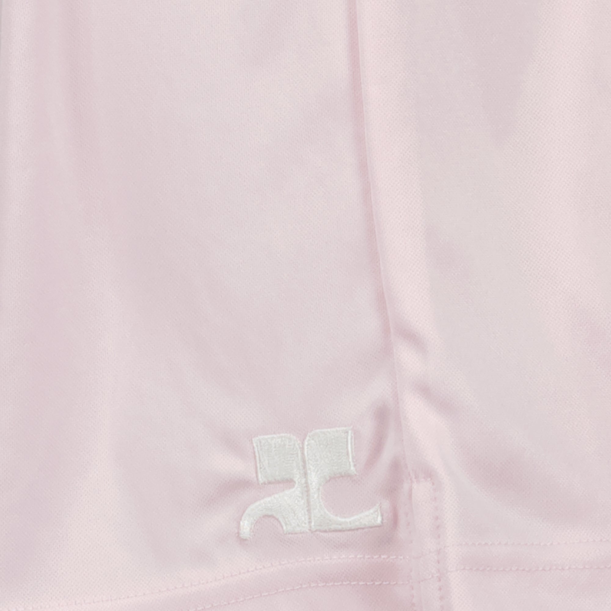 Bild der rosa AC Sportshorts der Marke Courrèges für Herren - Frühjahr/Sommer 2026 - Detailansicht_1
