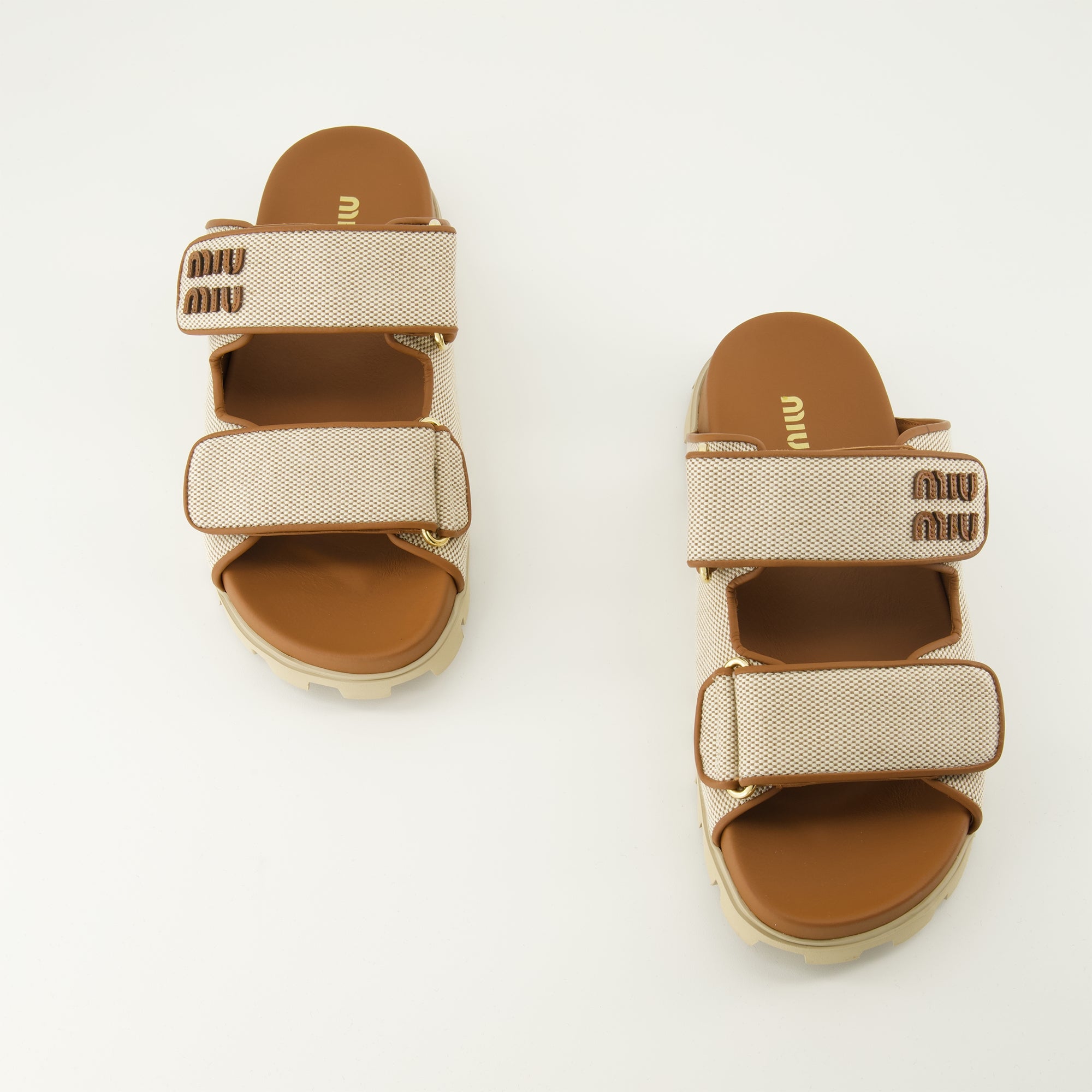 Bild der Miu Miu Beigen Stoffmules für Damen - Saison Frühling-Sommer 2026 - Draufsicht auf das Paar Schuhe