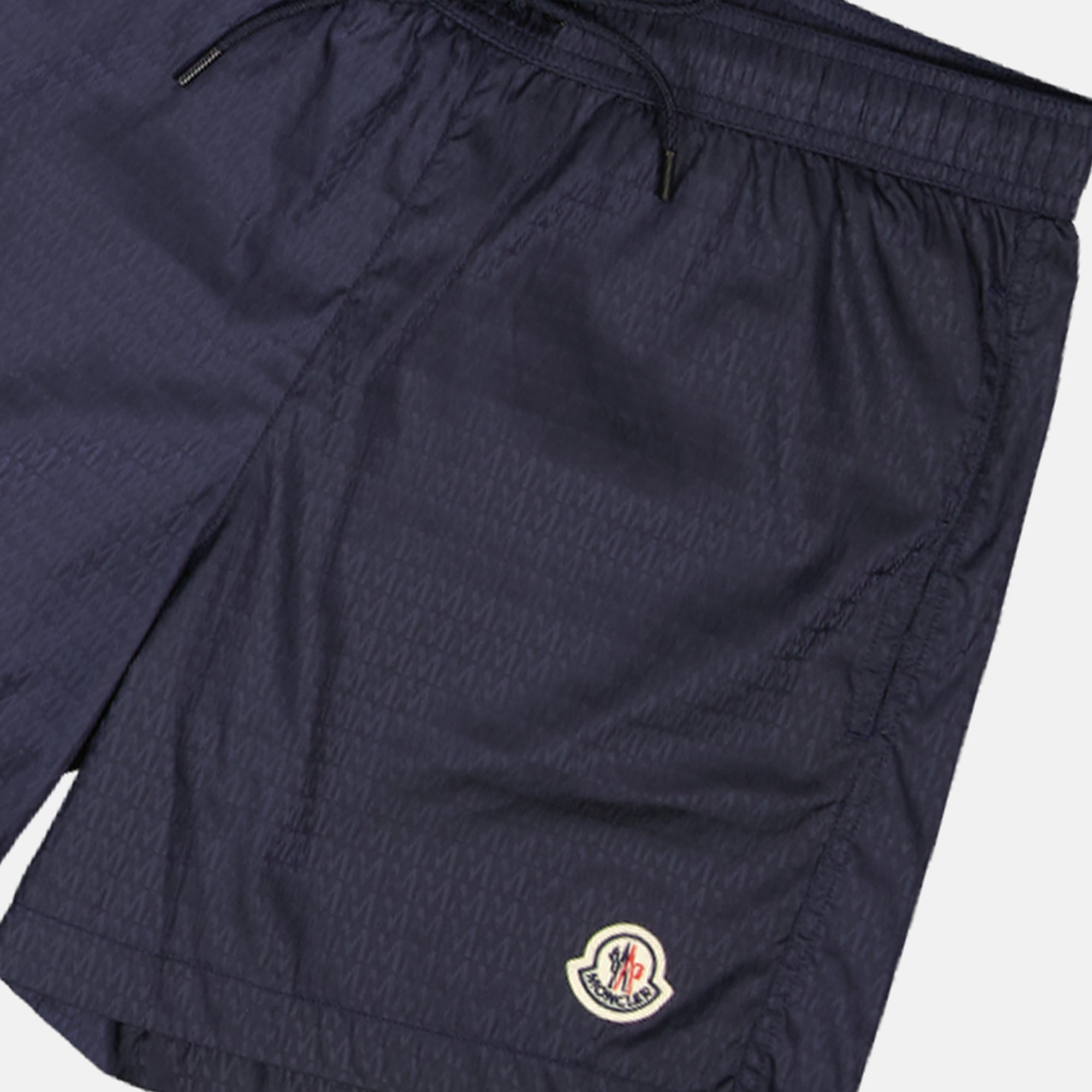 Image of the Moncler branded monogram swimsuit for men - Spring-Summer 2025 - Detailed View_1