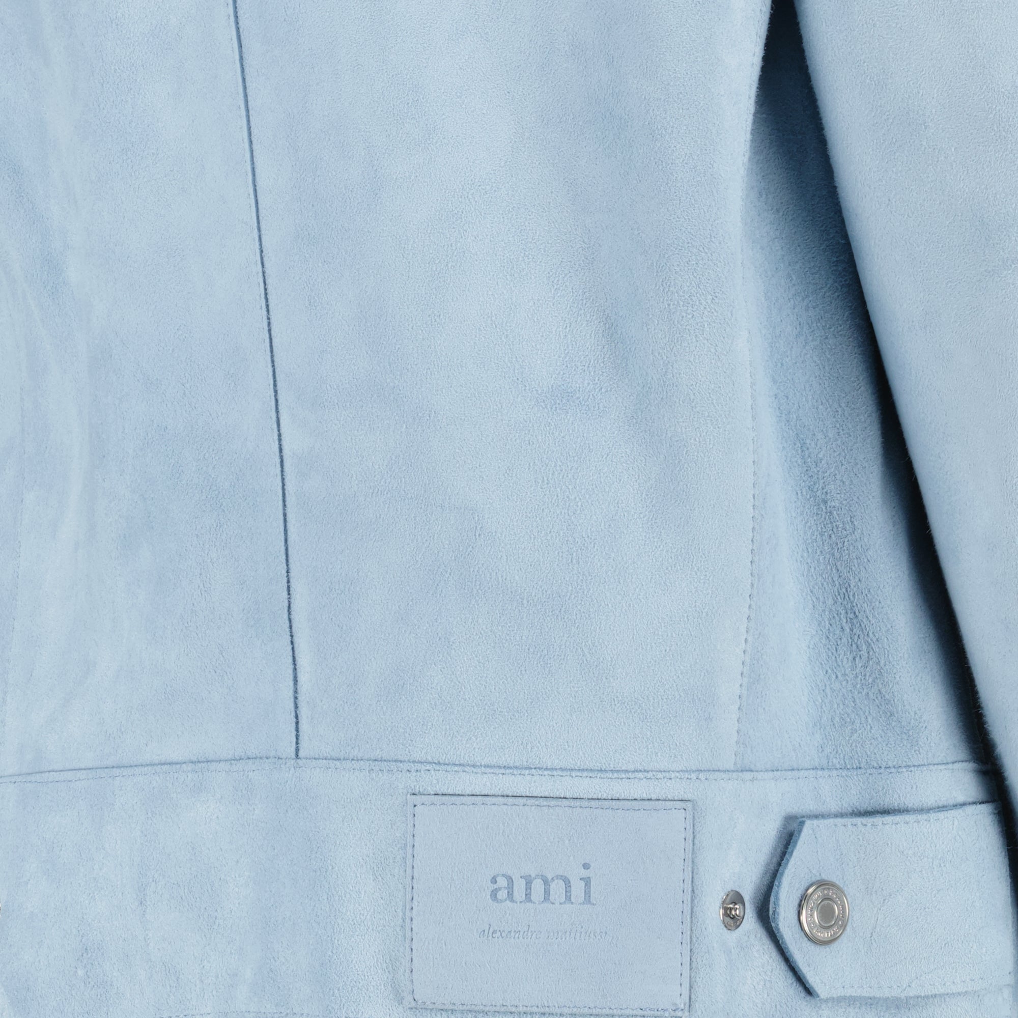 Image of the blue leather jacket from the brand Ami PARIS for Unisex - Fall-Winter Season 2025 - Detailed View_1