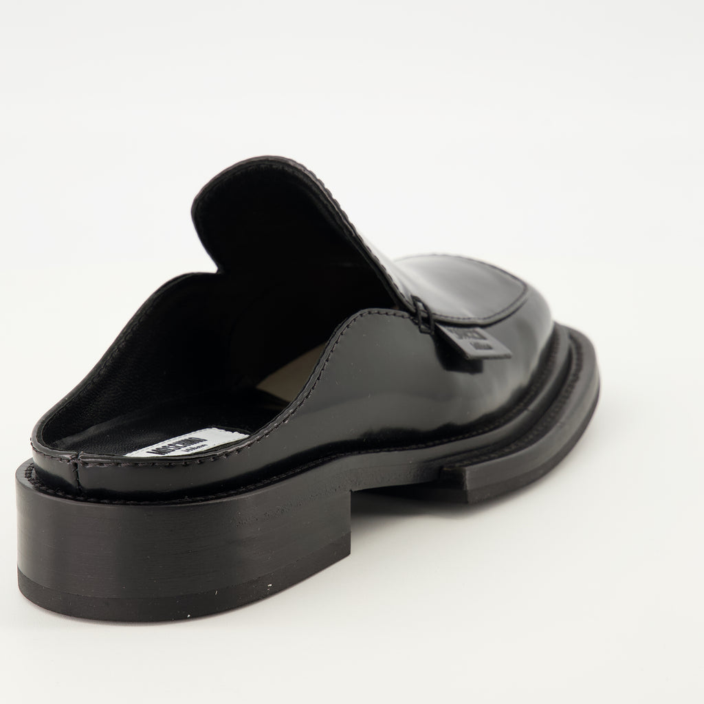 Image of Moschino brand leather mules for women - Fall-Winter 2025 season - Back right three-quarter view