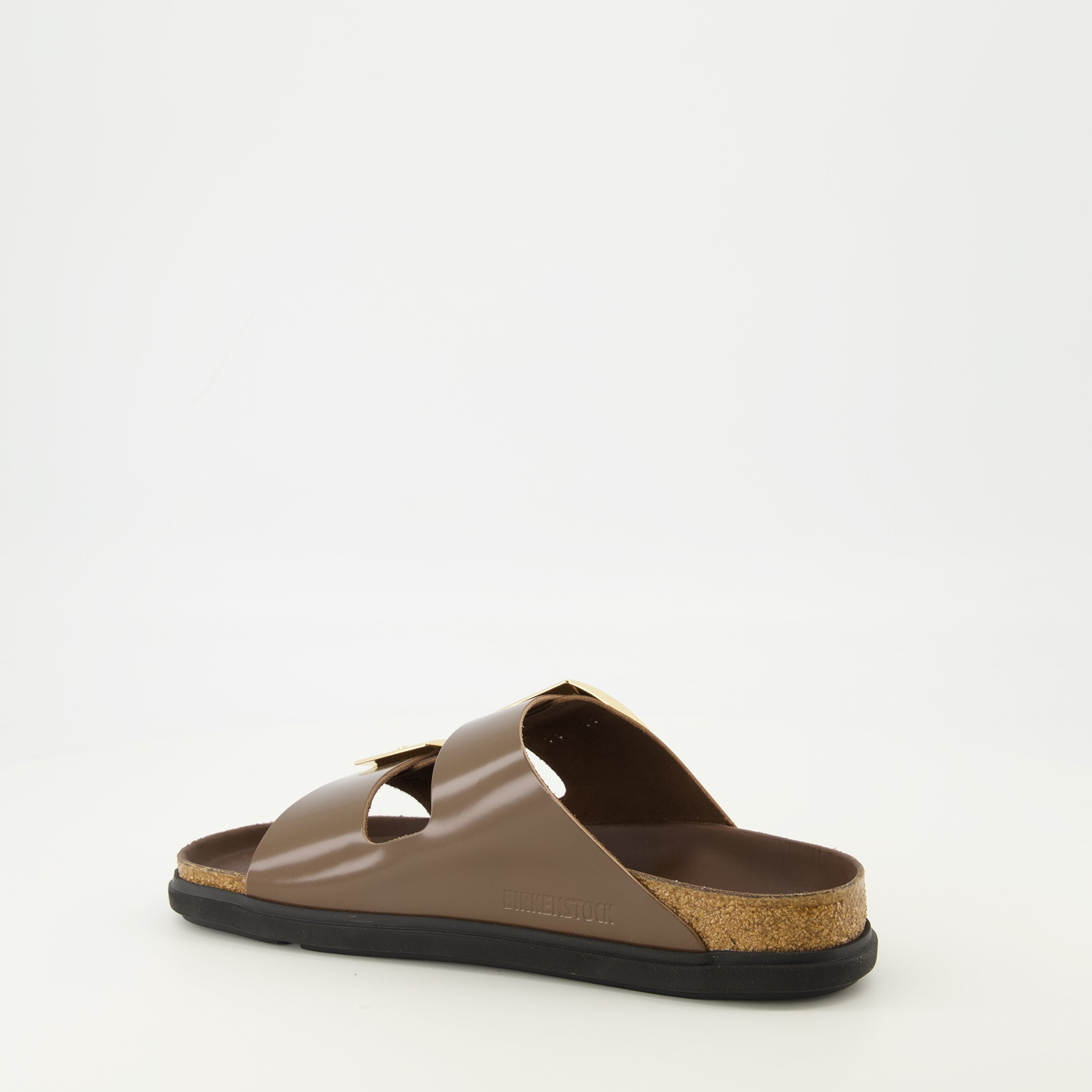 Image of the Arizona Droplet Buckle brown sandals from the brand Birkenstock for Women - Spring-Summer 2026 - Three quarter right back view