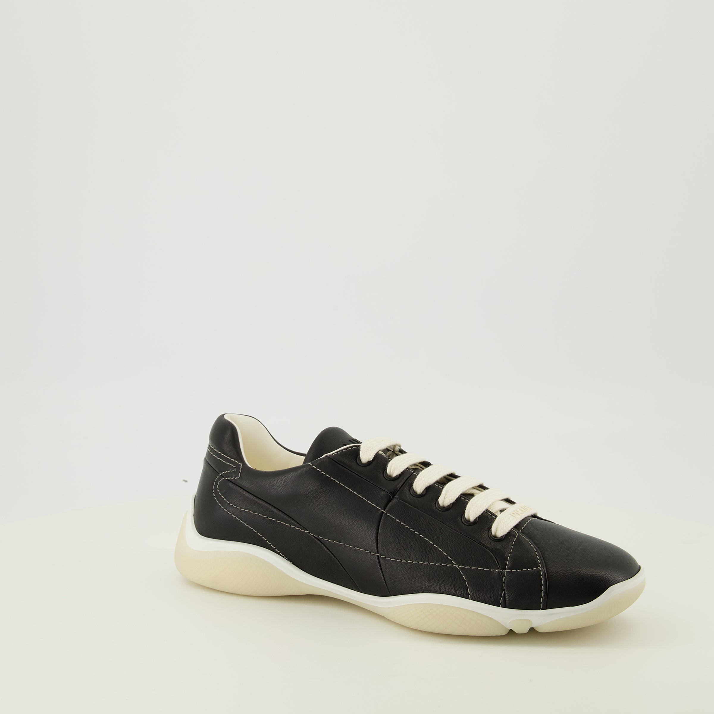 Image of the Prada Men's Black Leather America's Cup Sneakers - Fall-Winter 2025 - Three-quarter front right view