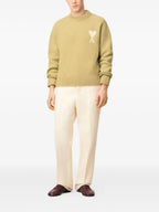 Image of the Ami heart sweater from the brand Ami PARIS for Unisex - Autumn-Winter Season 2025 - Detailed View_8