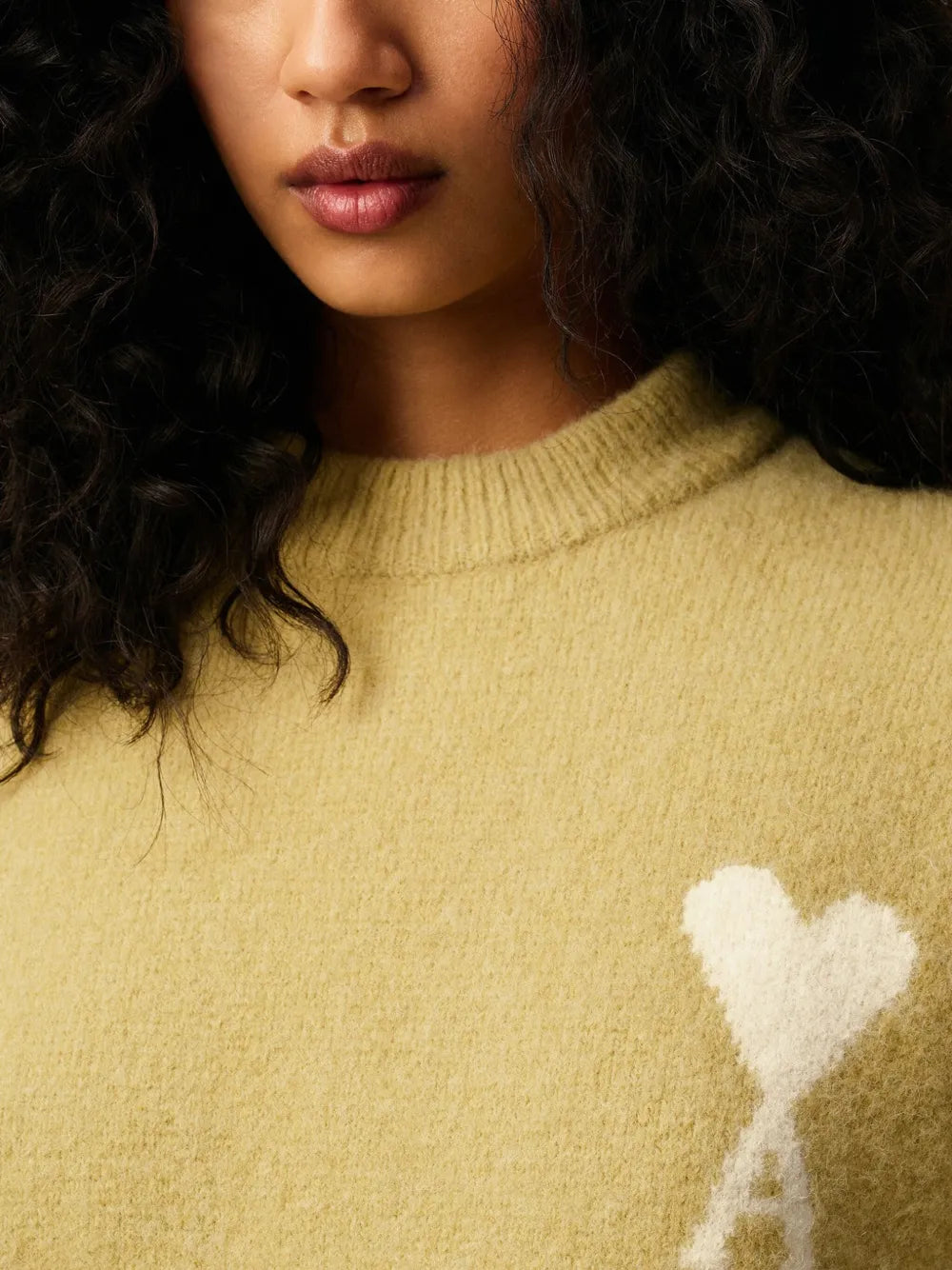 Image of the Ami heart sweater from the brand Ami PARIS for Unisex - Autumn-Winter Season 2025 - Detailed View_7