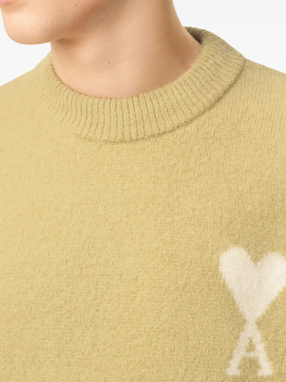 Image of the Ami heart sweater from the brand Ami PARIS for Unisex - Autumn-Winter Season 2025 - Detailed View_5