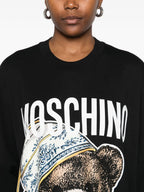 Image of the Teddy Bear Dress by the brand Moschino for Women - Fall-Winter 2025 - Detailed View_5