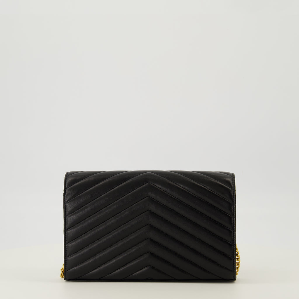 Image of the Cassandre black chain wallet from the Saint Laurent brand for Women - Fall-Winter 2025 - Back View