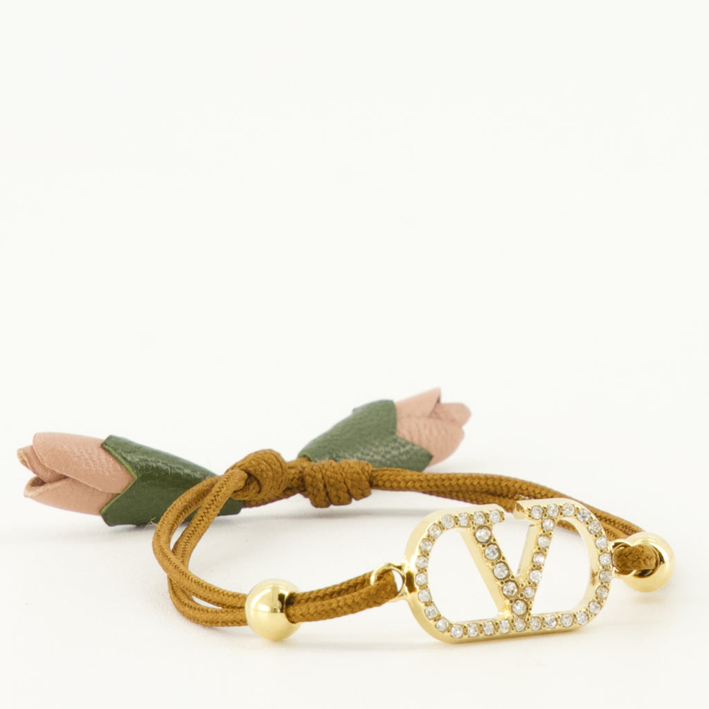 Image of the Vlogo Bracelet with brown cord by Valentino Garavani for Women - Spring-Summer 2026 - Detailed View 2