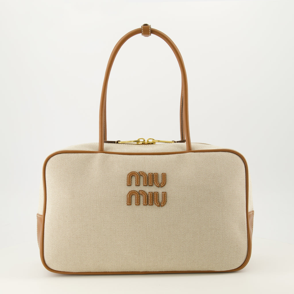 Image de l'article Sac en toile et cuir de la marque Miu Miu pour Femme - Saison Automne-Hiver 2025 - Vue de Face