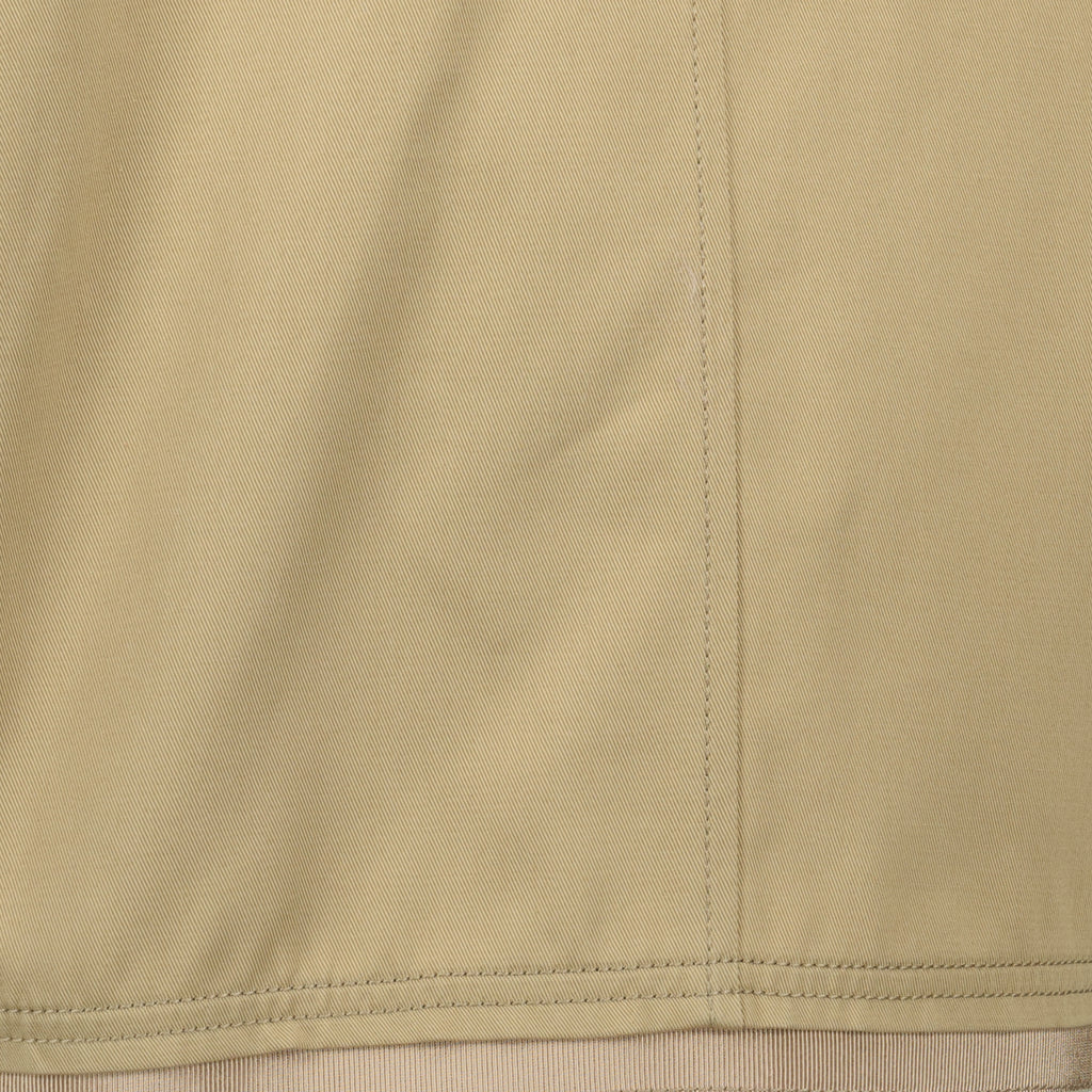 女性用のパトゥブランドの短いベージュジャケットの画像 - 2026年春夏 - 詳細ビュー1