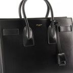 Sacs à main et épaule Sac de jour small en cuir noir Saint Laurent Noir Femme