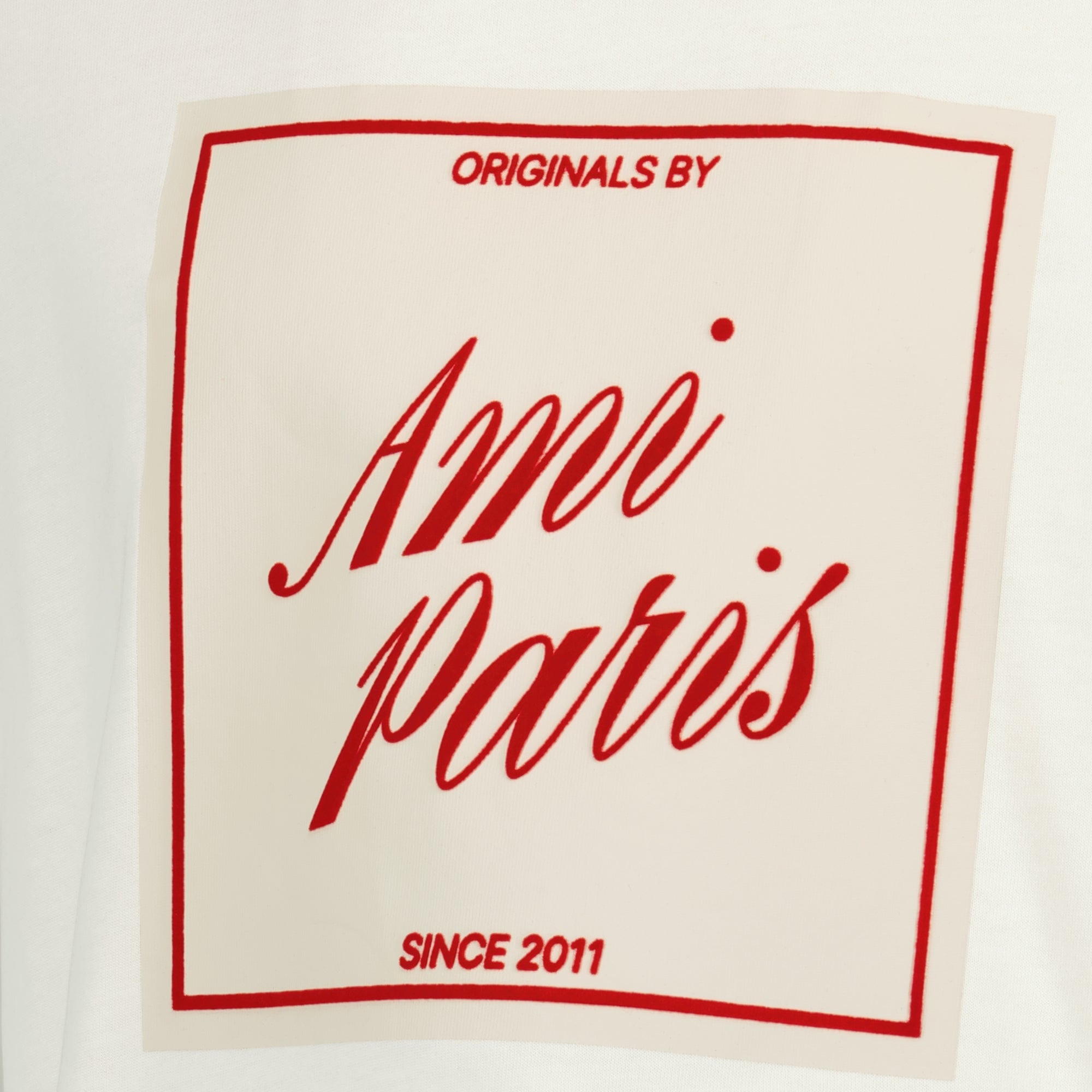 Image de l'article T-shirt imprimé blanc et rouge de la marque Ami PARIS pour Unisex - Saison Printemps-Été 2026 - Vue détaillée_1