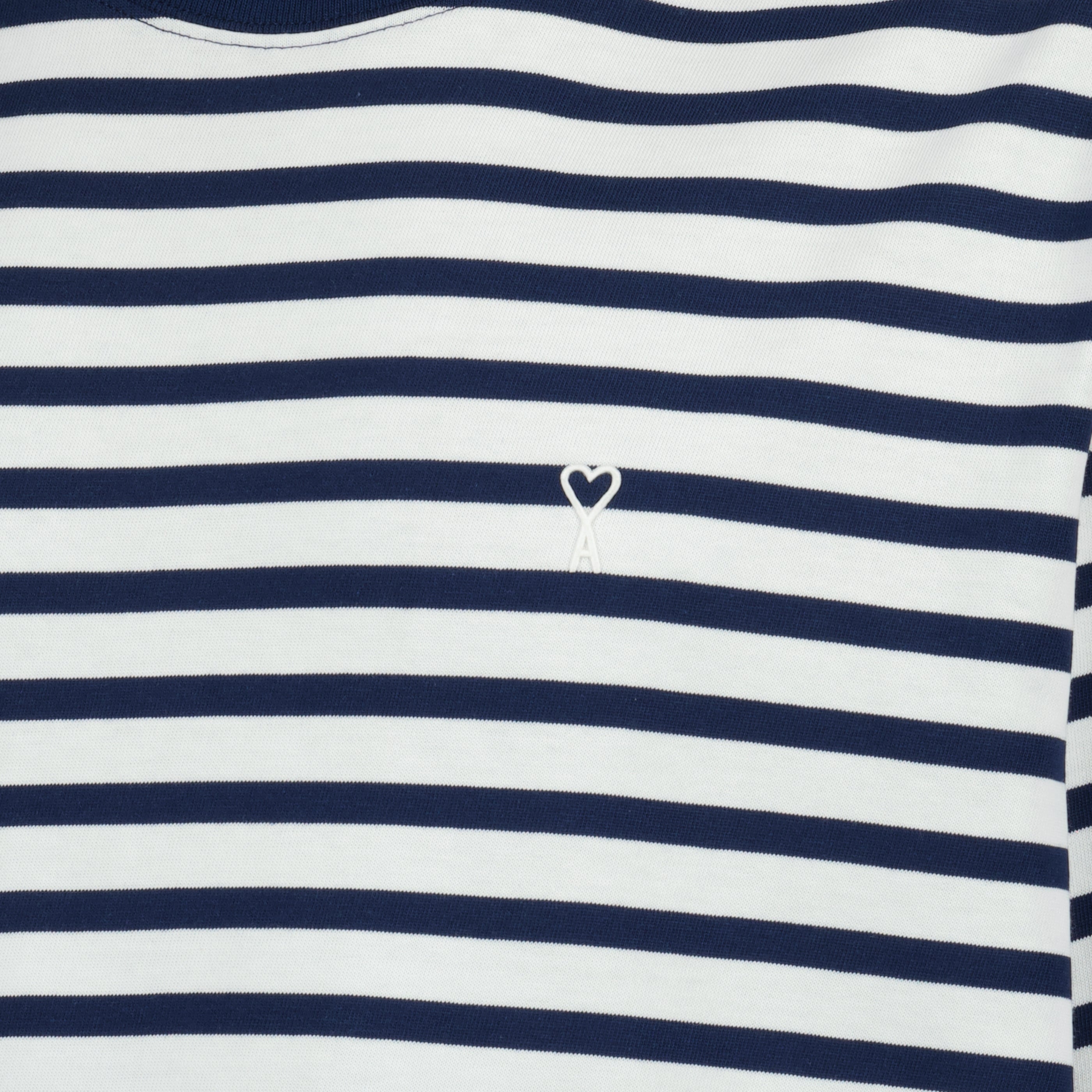 Image of the AMI heart striped cotton T-shirt from the brand Ami PARIS for Unisex - Spring-Summer 2026 - Detailed View_1