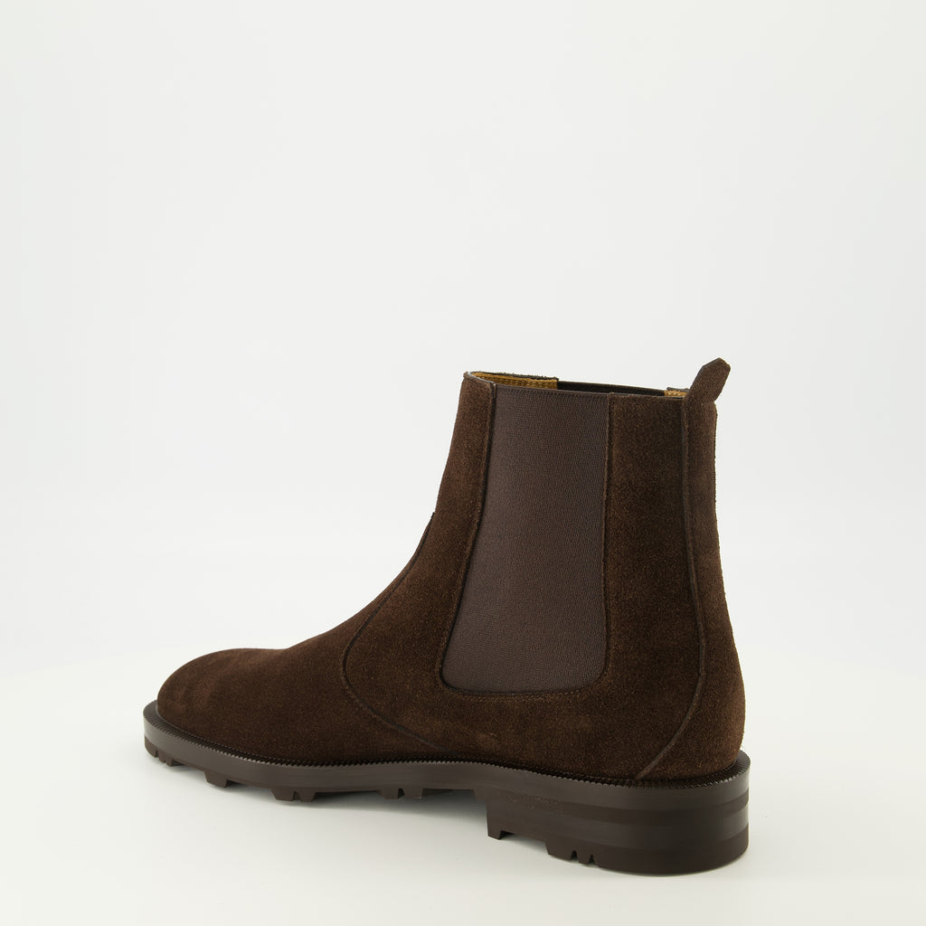 Imagen de las botines Chelsea marrones de la marca Dior para Hombre - Temporada Primavera-Verano 2026 - Vista en tres cuartos trasera derecha