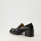 Imagen de los mocasines de piel con tacón de Tod's para Mujer - Temporada Otoño-Invierno 2025 - Vista de tres cuartos trasera derecha