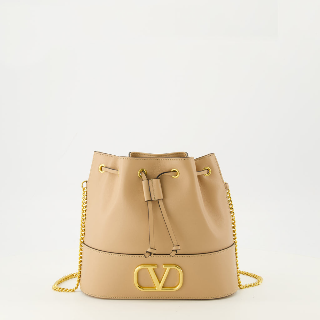 バレンティノ・ガラヴァーニの女性用ベージュミニバケットバッグの画像 - 2026年春夏シーズン - 正面図