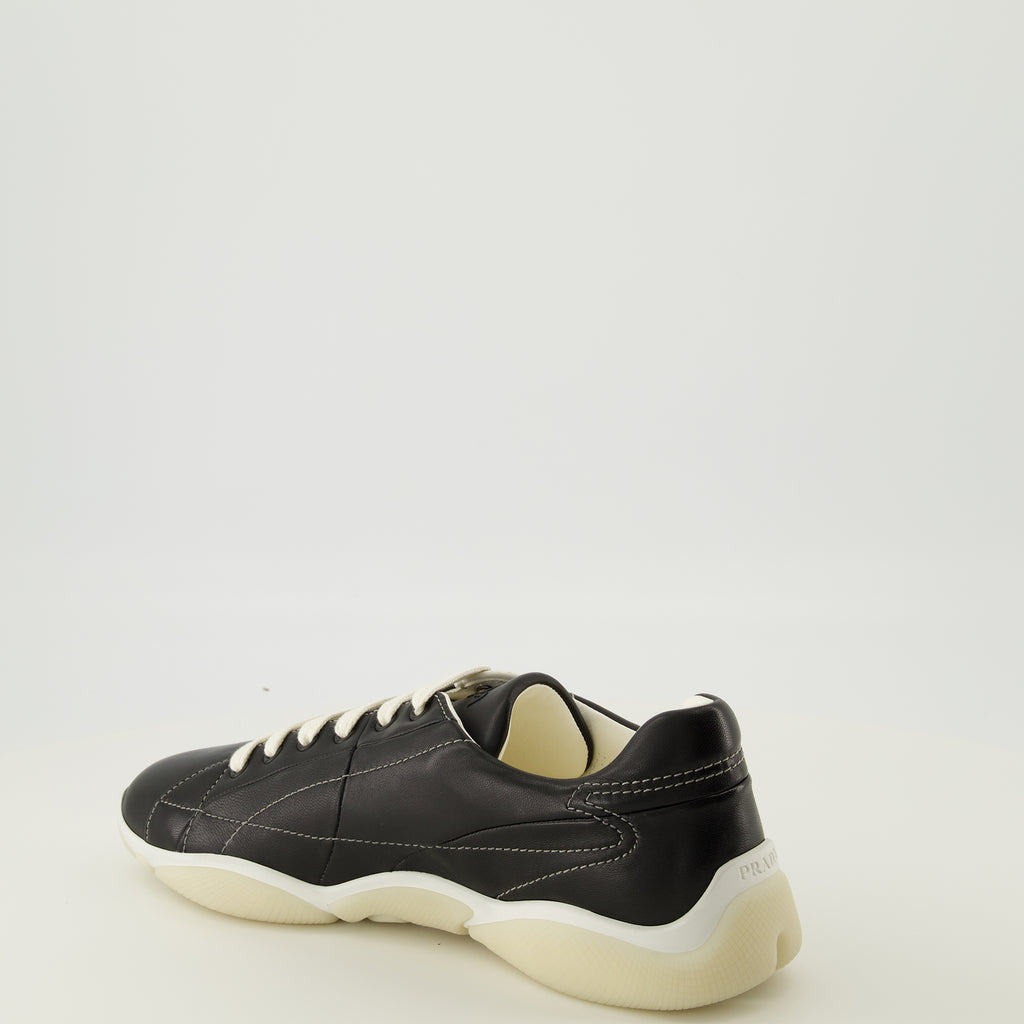 Image of the Prada Men's Black Leather America's Cup Sneakers - Fall-Winter 2025 - Three-quarter back right view