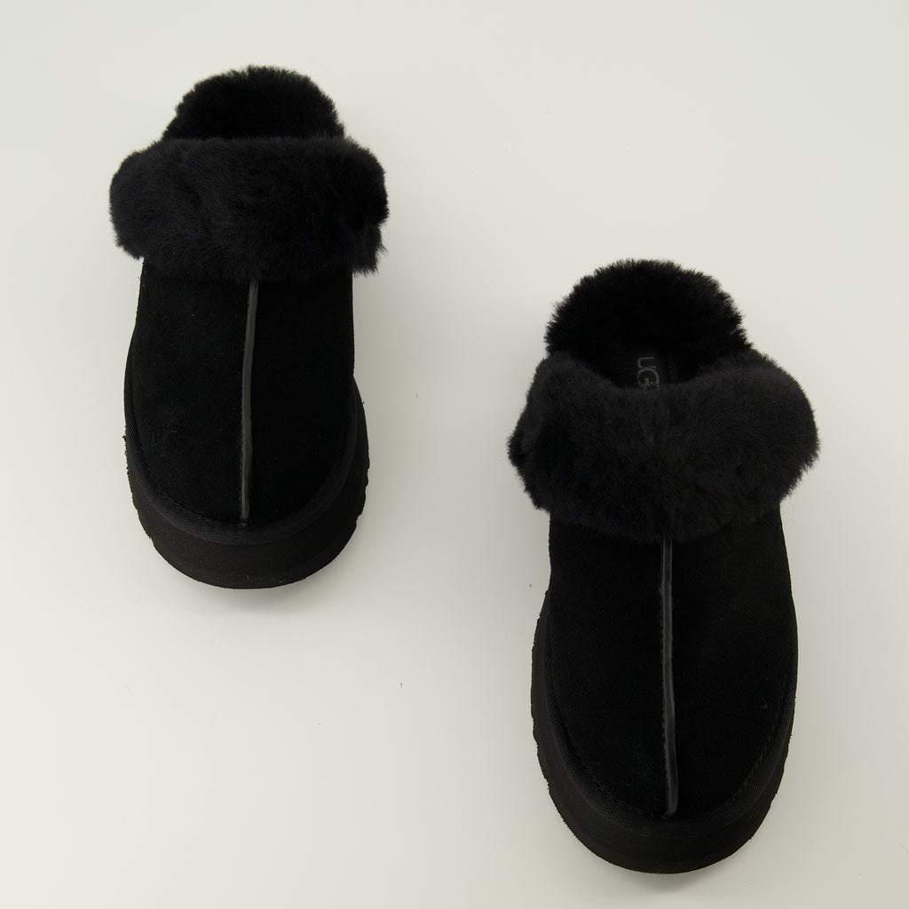 Uggの女性用黒ディスケットミュールの商品画像 - 2026年春夏シーズン - 靴のペアの上面図