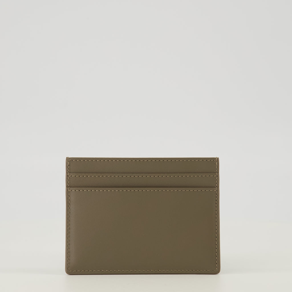 Image of the khaki leather cardholder from the brand Saint Laurent for Men - Spring-Summer 2026 - Back View