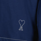 Immagine del polo a maniche lunghe blu navy in cotone del marchio Ami PARIS per Uomo - Stagione Primavera-Estate 2026 - Vista Dettagliata_1